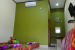 Tempat Tidur AC Andrew Pasput Sawarna